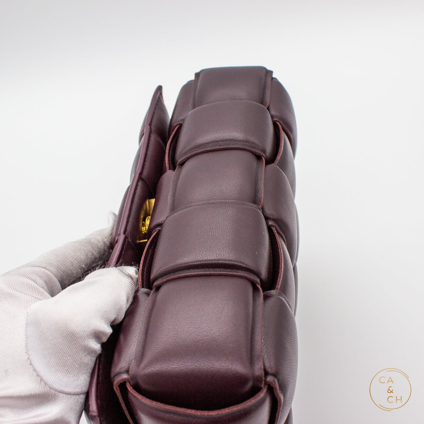 Bottega Veneta Padded Cassette Bag in Plum Lambskin with Antique Gold Hardware Medium