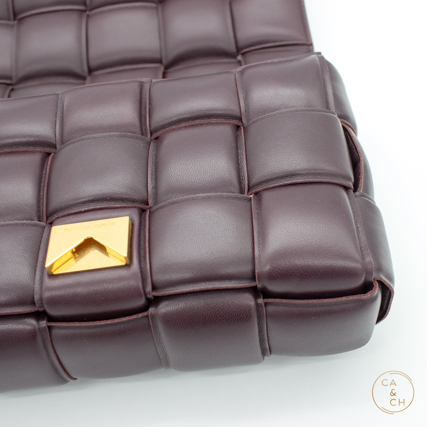 Bottega Veneta Padded Cassette Bag in Plum Lambskin with Antique Gold Hardware Medium