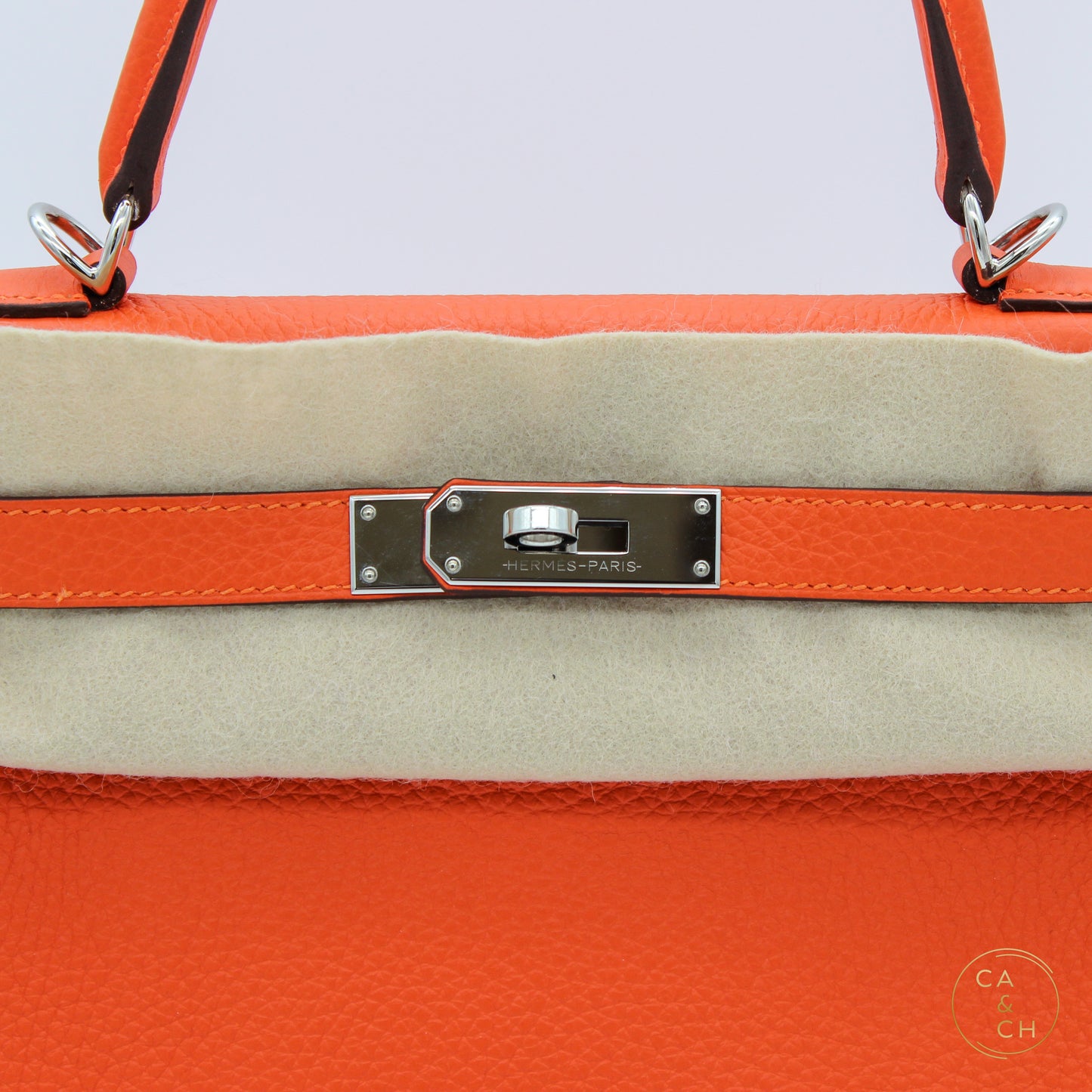 Hermès Kelly 28 Orange with Palladium Hardware in Clemence Leather Retourne U stamp