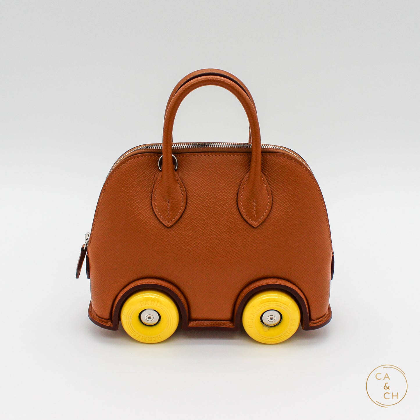 Hermès Mini Bolide Bag in Gold with Yellow Wheels, 2023 Edition