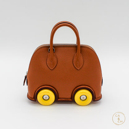 Hermès Mini Bolide Bag in Gold with Yellow Wheels, 2023 Edition