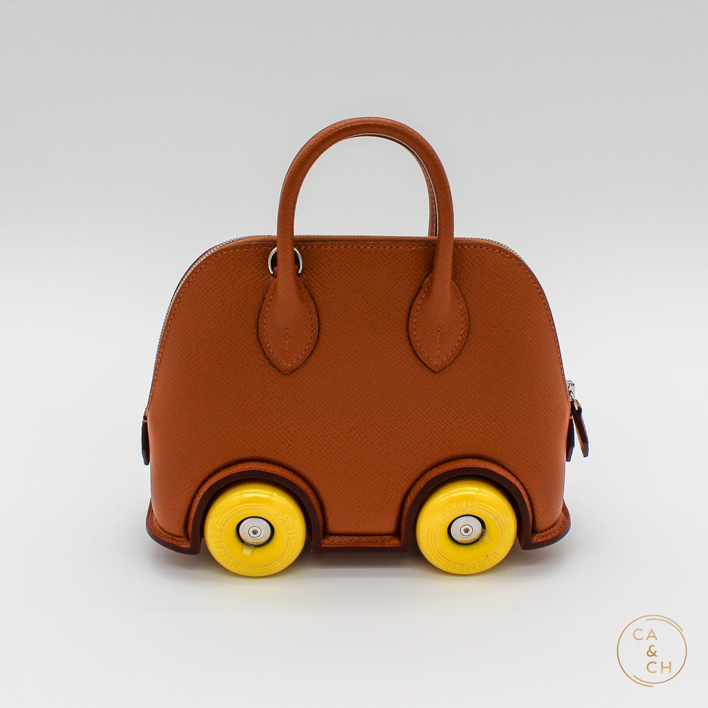 Hermès Mini Bolide Bag in Gold with Yellow Wheels, 2023 Edition